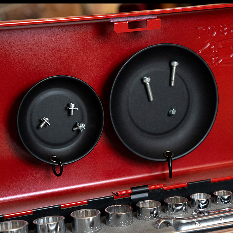 Firmly fixed to metal surfaces with strong magnets.